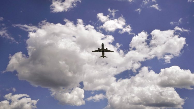 An airliner takes off from the Portland International Jetport in June. Flights depart to the west unless the FAA radar in Gray is out and they are required to fly east over the harbor.