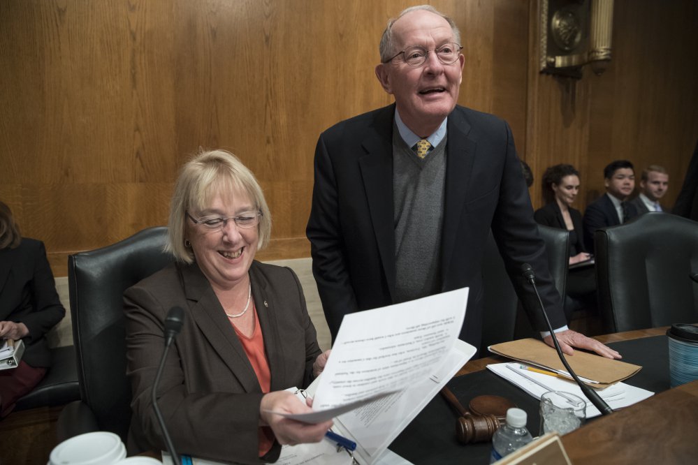 Sen. Patty Murray, D-Wash., ranking member, and Sen. Lamar Alexander, R-Tenn., chairman of the Health, Education, Labor and Pensions Committee, confer about the health care proposal.