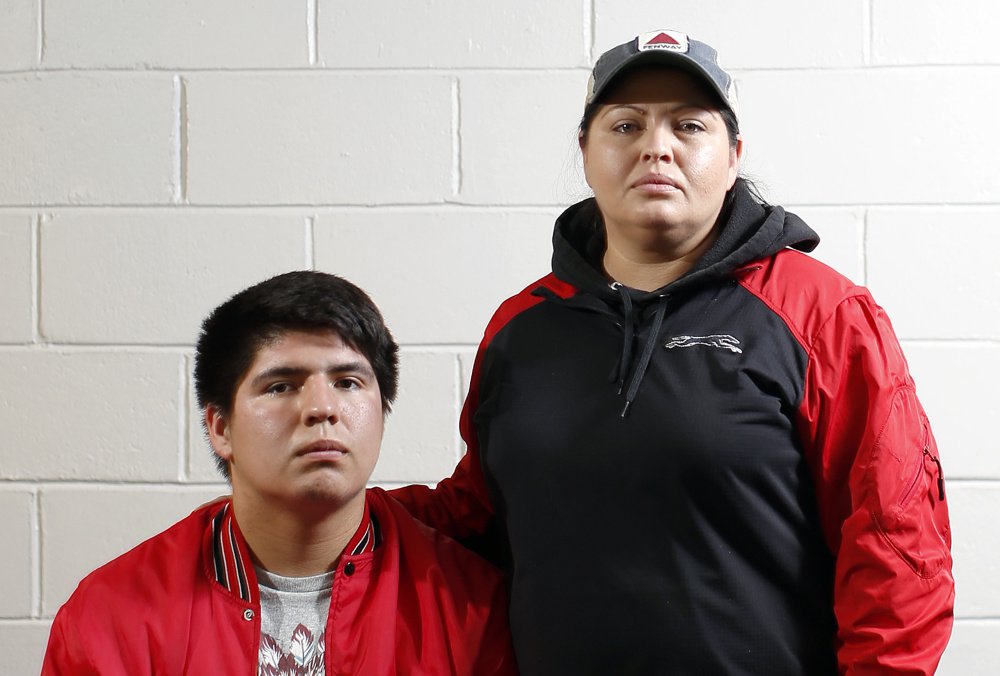 Lisbon High quarterback Lucas Francis and his mother, Amelia Tuplin, are Micmac Indians.