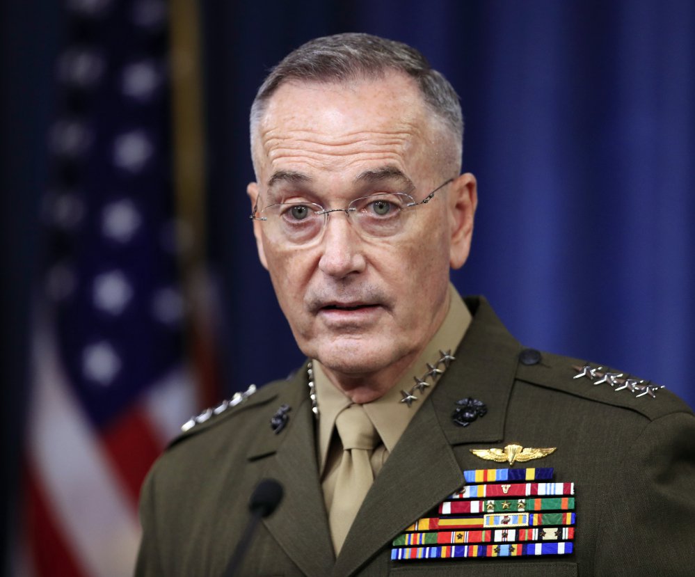 Gen. Joseph Dunford speaks to reporters about the Niger operation during a briefing at the Pentagon on Monday. U.S. troops were returing to base when ambushed, he said.