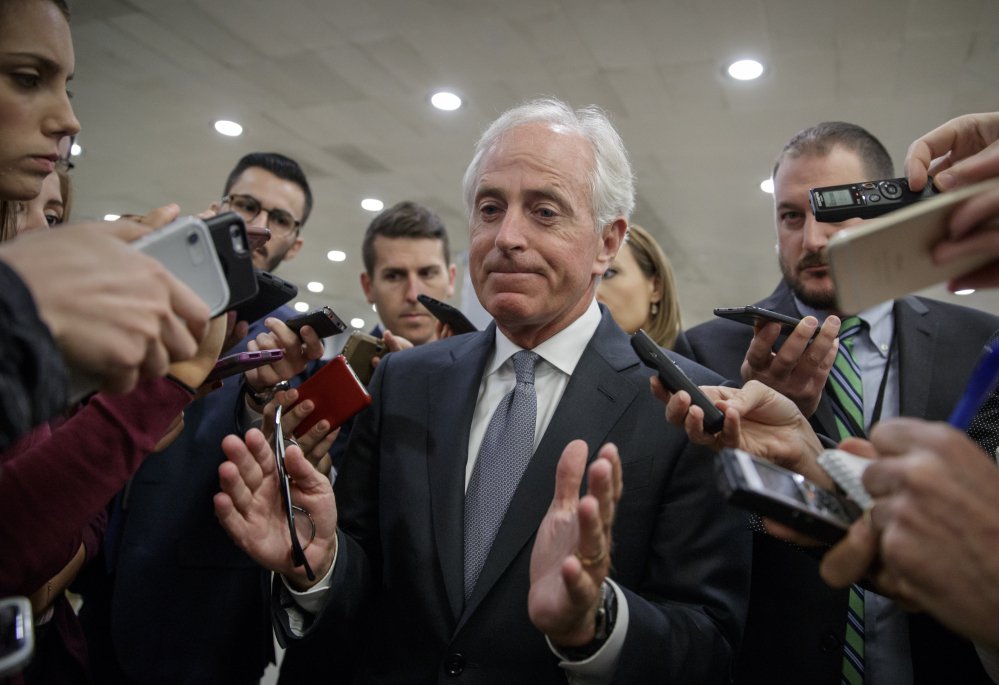 Senate Foreign Relations Committee Chairman Bob Corker, R-Tenn., talks to reporters as he returns to his office from a vote on Capitol Hill on Wednesday. He is a vehement critic of President Trump.