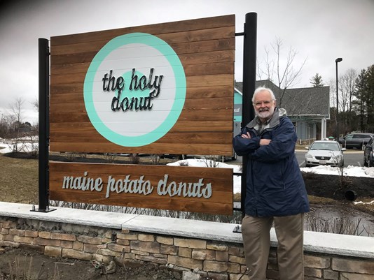 Allan Kelis, co-owner of The Holy Donut chain, died Oct. 23.