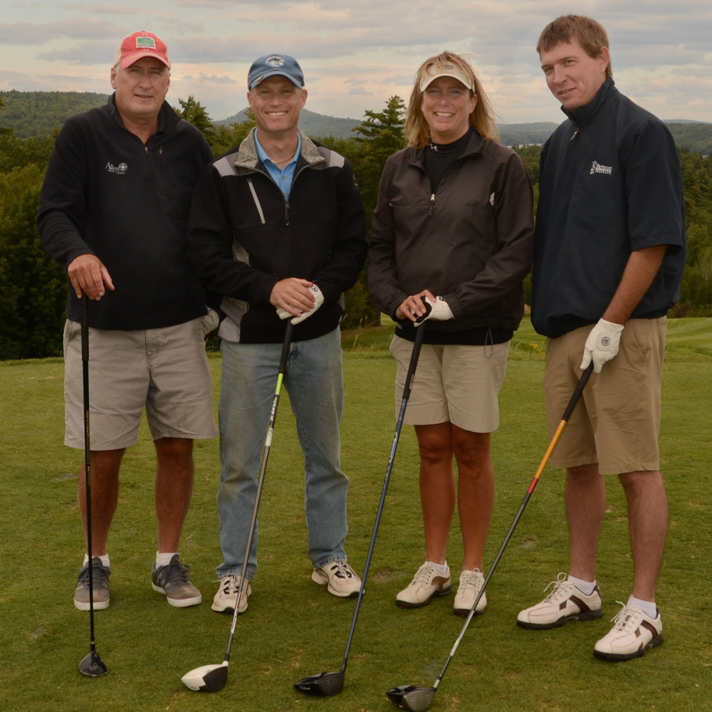 First Place Net Award was presented to GHM Insurance/Allen Insurance & Financial at this year's Big Brothers Big Sisters of Mid-Maine Golf Fore Kids' Sake at Belgrade Lakes. From left are Dan Wyman, Brian Beaulieu (Allen Agency) Laura Rowe and James Sanborn.