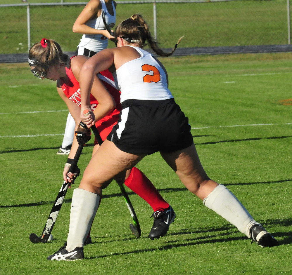 Winslow senior Natalie Greene applies pressure to a Dexter player during a game Monday in Winslow.