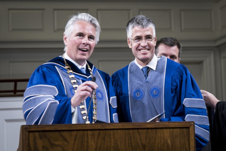 Colby College President David Greene introduces Alec MacGillis, the 2017 Elijah Parish Lovejoy Award recipient at the 65th Elijah Parish Lovejoy Convocation at Lorimer Chapel at Colby College in Waterville on Monday. MacGillis currently covers politics and government for ProPublica and is author of a 2014 biography of Senator Mitch McConnell.
