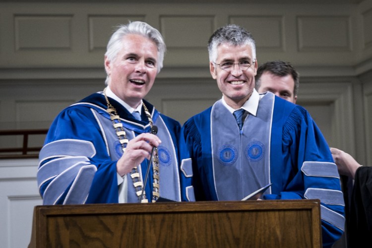 Colby College President David Greene introduces Alec MacGillis, the 2017 Elijah Parish Lovejoy Award recipient at the 65th Elijah Parish Lovejoy Convocation at Lorimer Chapel at Colby College in Waterville on Monday. MacGillis currently covers politics and government for ProPublica and is author of a 2014 biography of Senator Mitch McConnell.