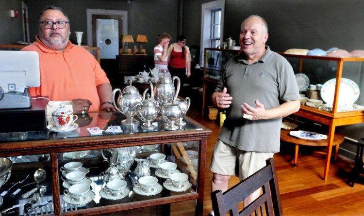 Lunanightday Antiques & Art store co-owners Mike Hildago, left, and Ed West opened their business on Appleton Street in Waterville at the beginning of September.
