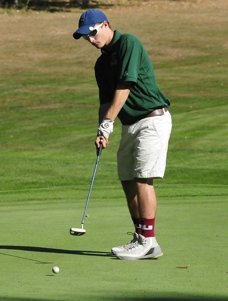 Nick Dube of Carrabec putts during the Mountain Valley Conference qualifier Wednesday at Natanis Golf Course in Vassalboro.