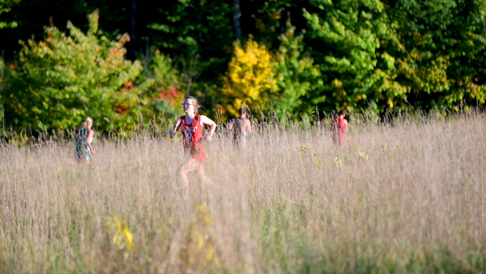 Runners make their way through the course Friday at the annual Mt. Blue Relays in Farmington.