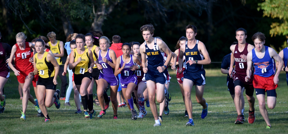Runners take off from the start of the Mt. Blue Relays on Friday in Farmington.