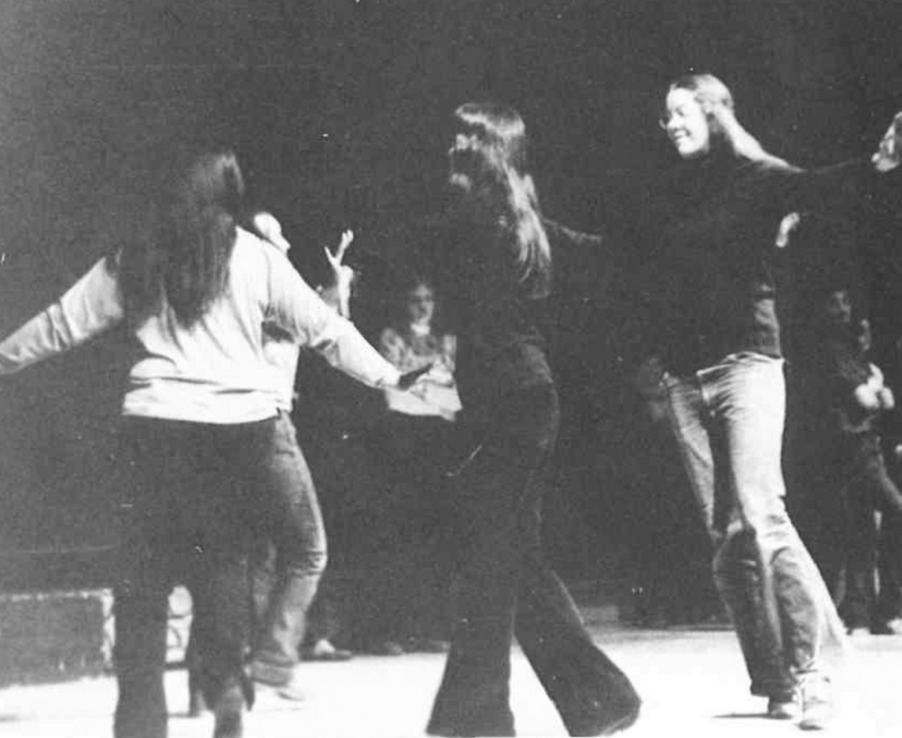 Amy Calder, right, dances on the Skowhegan Area High School stage in the early 1970s, as seen in a yearbook photo. She was a Pick-a-Little Lady, rehearsing for "Music Man."