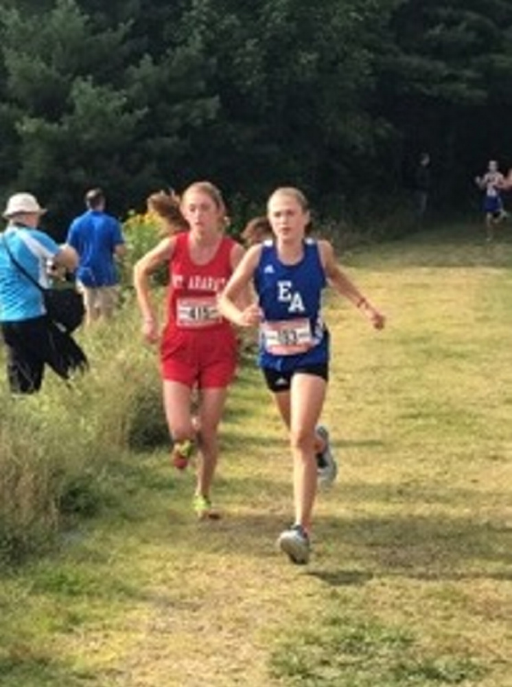 Courtney Paine, right, has had a successful freshman season for the Erskine girls cross country team, showing tremendous promise for the next three years.