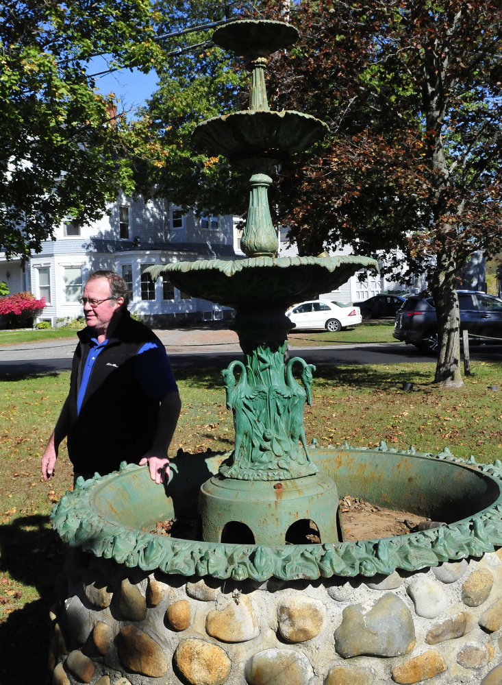 Skowhegan Road Commissioner Greg Dore said his highway crew stood the century-old fountain at Main Street Commons off Main Street in Skowhegan upright Thursday. The fountain had been vandalized recently.