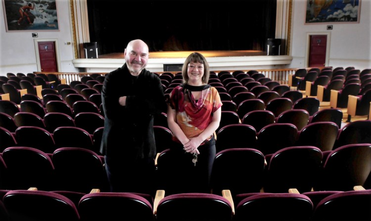 Skowhegan Opera House Committee members Jon Kimbell and Manager Cara Mason stand in March inside the Skowhegan historic landmark.