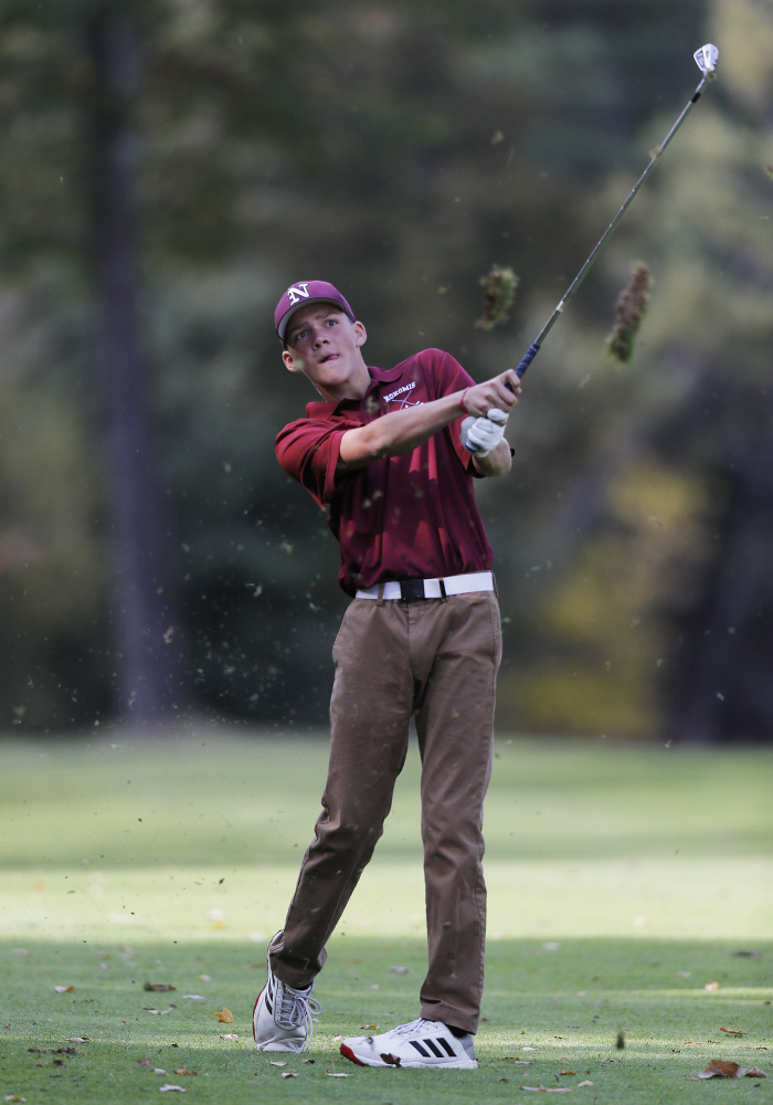 Nokomis' Samuel Smestad drives from the fairway during the state individual golf championships Saturday at Natnis Golf Course.