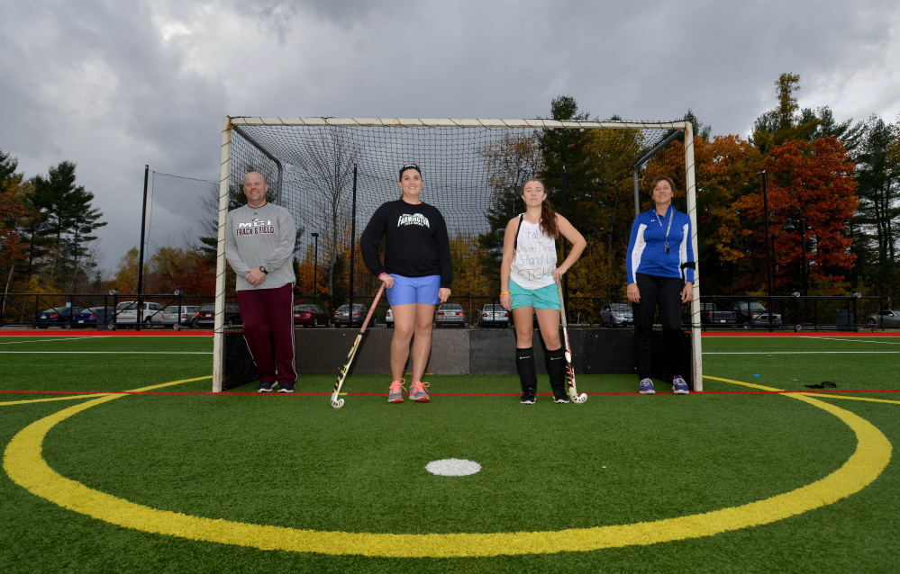 The Hughes family from left to right Greg, Meghan, Alison, and Nancy pose  at Thomas College after an Oct. 29, 2015 practice.