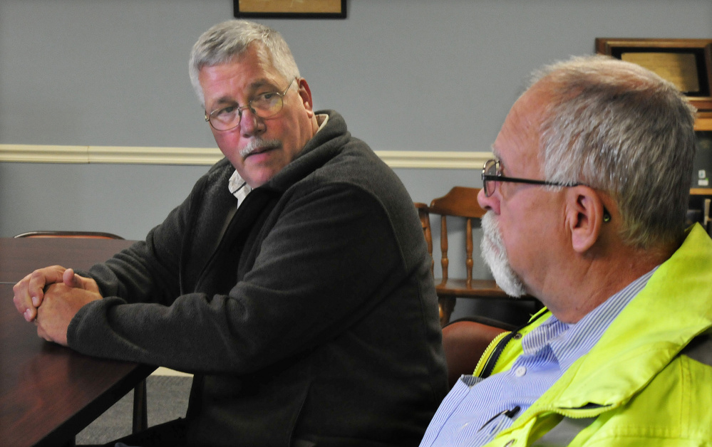 Winslow Town Manager Michael Heavener, left, and Winslow Public Works Director Paul Fongemie may have to look at curbside pickup, a penalty system or other ideas to increase recycling in Winslow after noting Monday that trash tonnage has changed little since a pilot recycling program was started in June.
