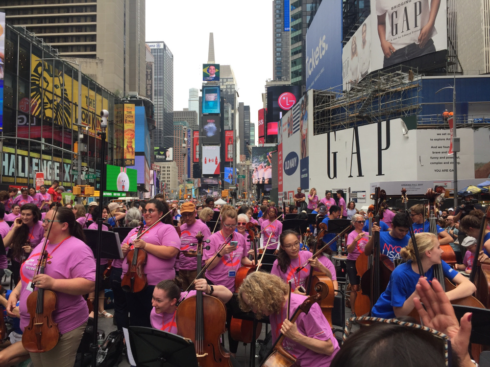 Phoebe Payne, a K-12 music teacher at Forest Hills School in Jackman, attended the annual Summer Music Teacher Educator's Workshop in July. The educators were asked to take part in a "pop-up" performance in New York City's Times Square.