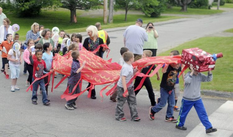 Teresa C. Hamlin School students parade through Randolph on June 13, 2016, after they read almost 1,500 books. The district superintendent has formed a committee to study the future of the school now that enrollment has dropped to 44 students.