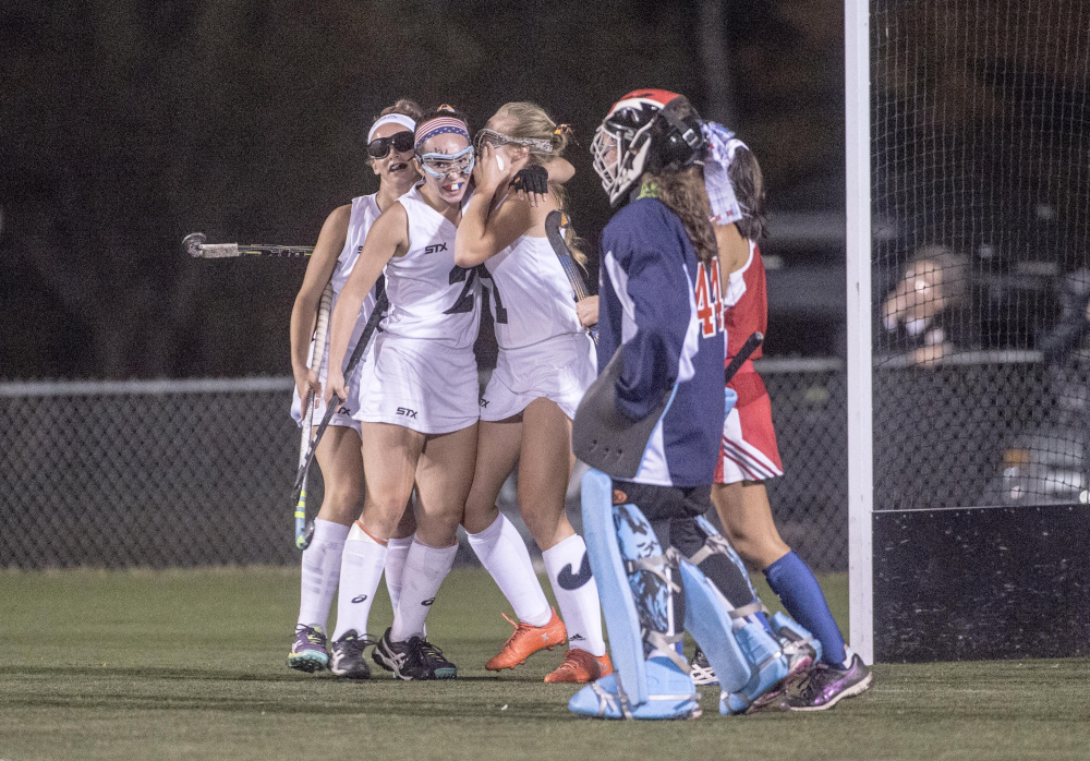 Skowhegan celebrates a first half goal against Messalosnkee during the Class A North championship game Tuesday at Hampden Academy.