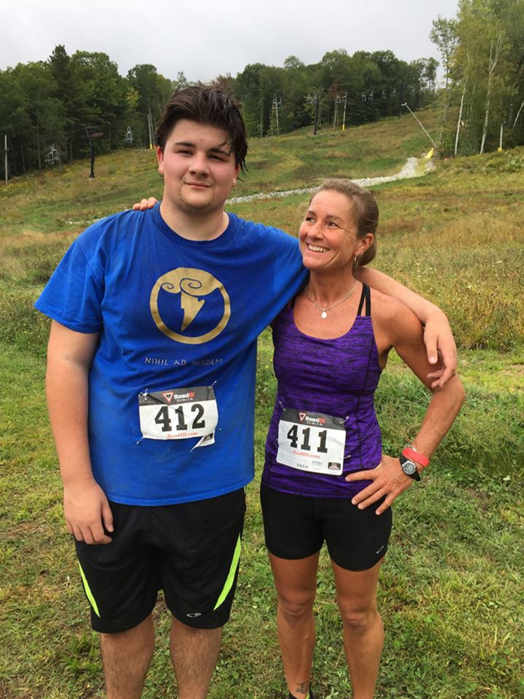 This photo posted in September 2016 to Alice Balcer's Facebook page shows Andrew Balcer, 17, and his mother, Alice, after a running competition. Andrew has been charged with two counts of murder in connection with the deaths of Alice and Antonio Balcer, his parents.