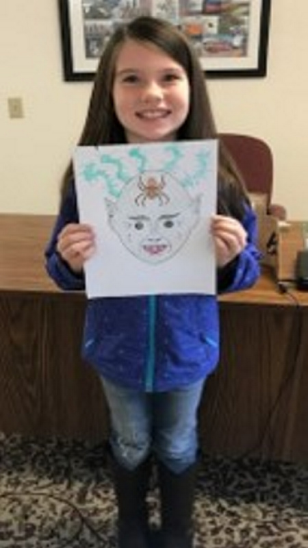 Camryn Swails, of Sidney, won the Harvest Festival coloring contest for children 6 to 8 years old.