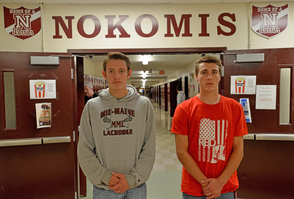 Nokomis football players Logan Rowell, left, and Coby Pinette pose at the high school Wednesday.