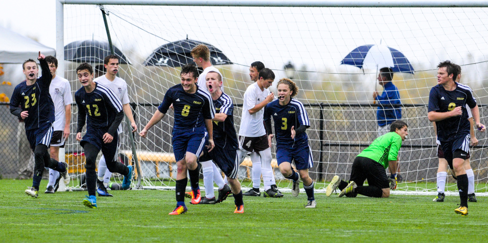 Traip celebrates the tying goal against Monmouth during a Class C South quarterfinal game Thursday at Kents Hill School.
