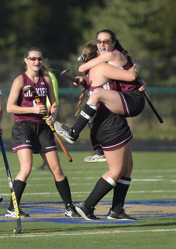 Maine Sunday Telegram photo by Shawn Patrick Ouellette 
 Addi Williams jumps into the arms of Maine Central Institute teammate Eva Bickford after Williams scored a second half goal in the Class B state championship game Saturday against York at Falmouth High School.