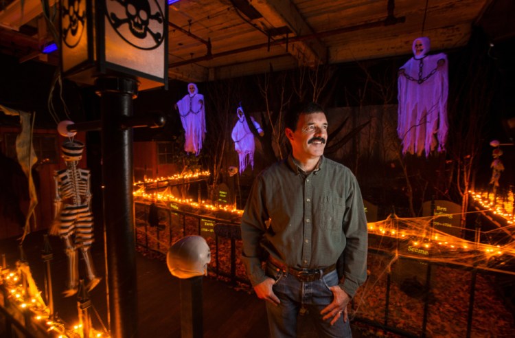 Donald Breton poses for a portrait Monday in the entrance to the Halloween haunted mill experience at the Olde Mill in north Vassalboro.