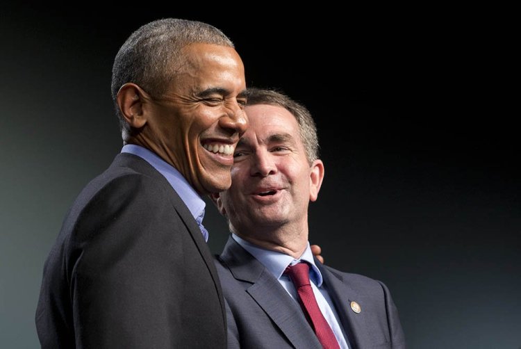 Former President Barack Obama laughs with Virginia's Democratic gubernatorial candidate Lt. Gov. Ralph Northam during a rally in Richmond, Va., Oct. 19.