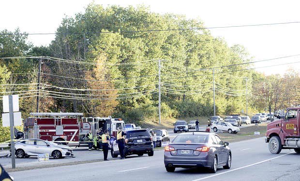 Traffic backs up on the Northbound lane of Washington Street as rescue personnel investigate the fatal accident in Auburn on Tuesday.