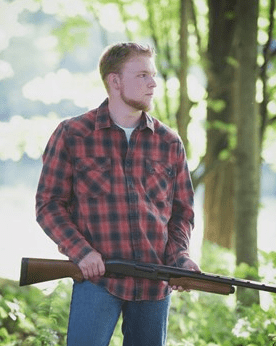 Wade Gelinas hoped the Bonny Eagle High School yearbook would use a photo in which he was holding his shotgun. Gelinas says his sport is hunting.