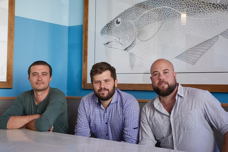 Mike Wiley, Andrew Taylor and Arlin Smith, owners of Eventide Fenway.
