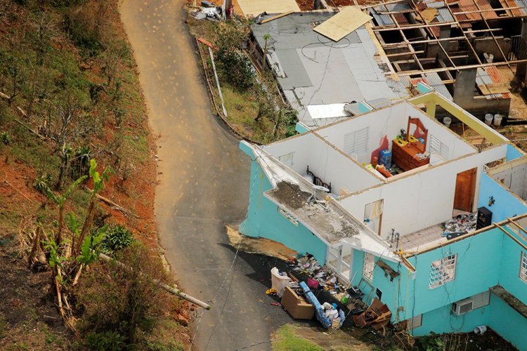 The interior contents of a home are seen from the air during recovery efforts following Hurricane Maria near Utuado, Puerto Rico, on Tuesday. 