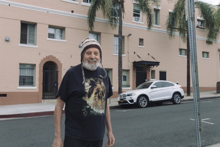 Wendell Jones stands in front of the building in West Hollywood, Calif., where he has lived for 20 years, now paying just $700 a month for a studio – half of its market value - because of a rent stabilization ordinance that was used as a model for one proposed in Portland.