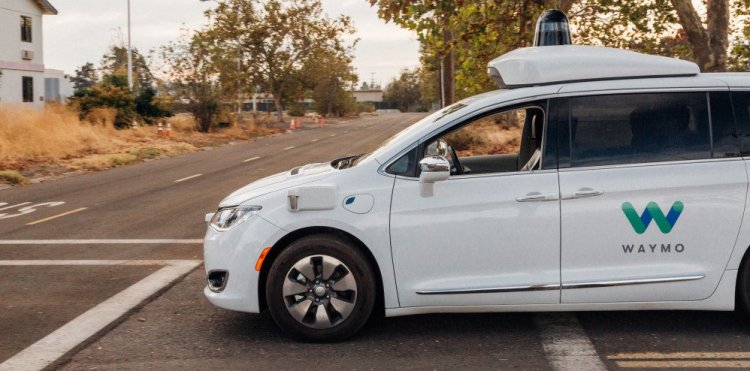 A Waymo self-driving van is tested in California. The car can detect bicyclists, pedestrians and vehicles, and stops when it detects a car coming the opposite way in its lane.