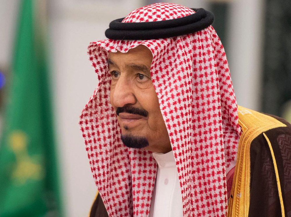 King Salman attends a swearing in ceremony in Riyadh on Monday. The king has sworn in new officials to take over from a powerful prince and former minister believed to be detained in the corruption sweep.