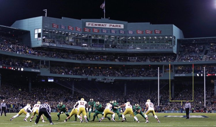 DeShone Kizer, now a quarterback with the Cleveland Browns, takes a snap as the Notre Dame quarterback against Boston College on Nov. 21, 2015 at Fenway Park in Boston, home of the Red Sox. The University of Maine football team takes on UMass on Saturday at Fenway Park.