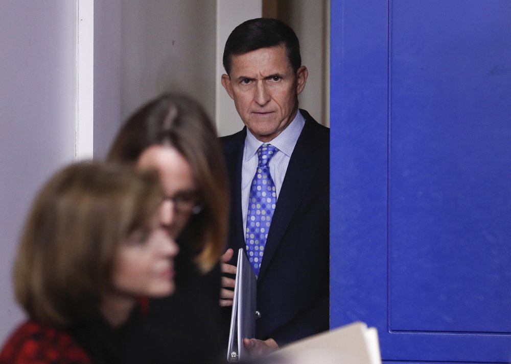 Ex-National Security Adviser Michael Flynn arrives for the daily news briefing at the White House in February before he was dismissed by President Trump.