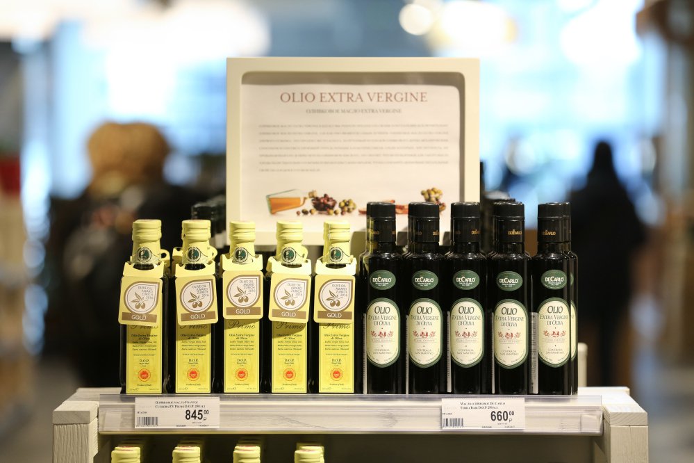 Olive oil is displayed at a food store in Moscow. Expected lower prices for olive oil may persuade homemakers and restaurants to switch back from sunflower-seed oil, which is cheaper.
