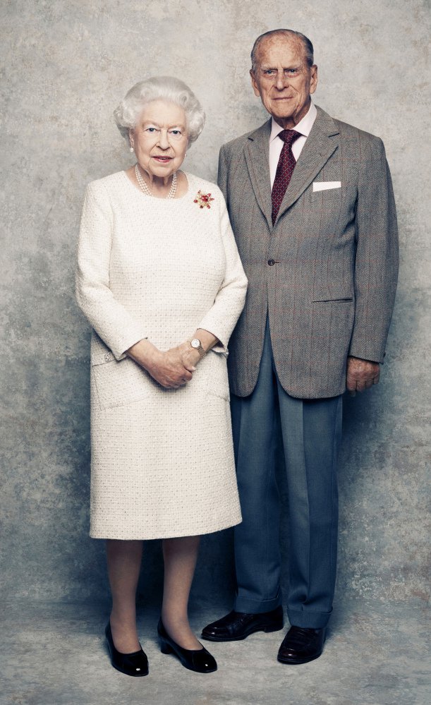 Queen Elizabeth and Prince Philip, shown against a platinum-textured backdrop at Windsor Castle in England, were married in 1947.