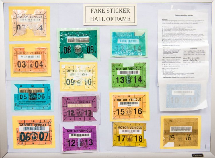 The Fake Sticker Hall of Fame at the state's traffic safety unit headquarters in Augusta displays confiscated forgeries.
