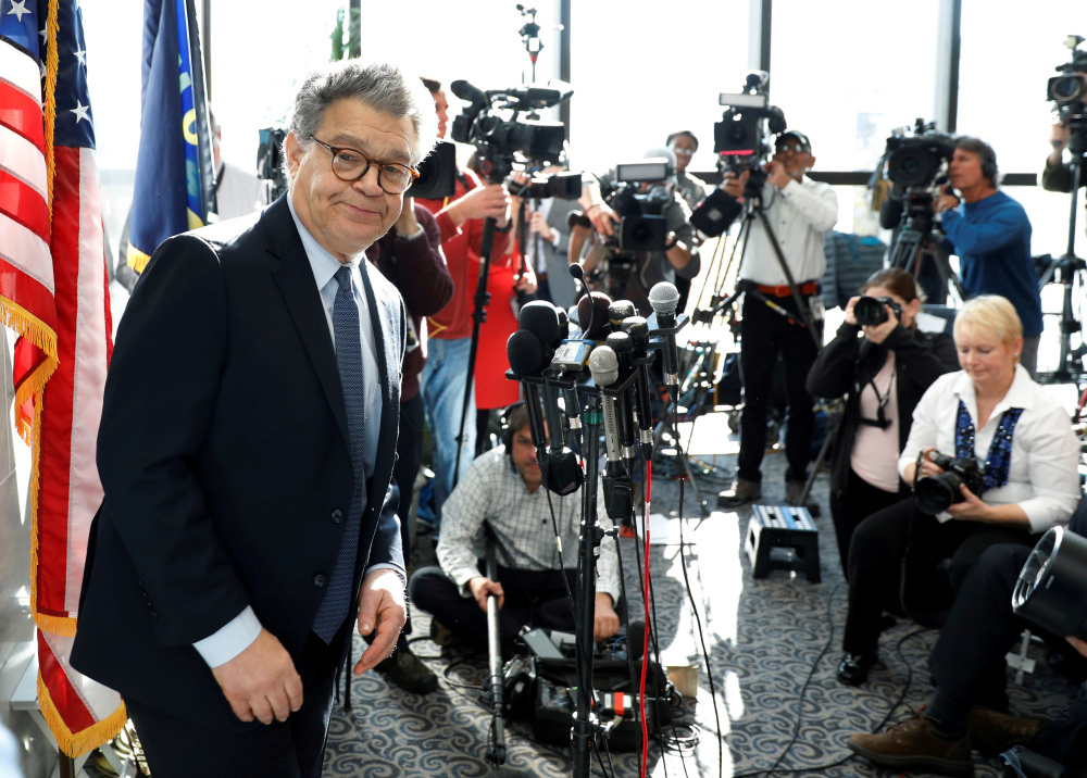 U.S. Sen. Al Franken ends a news conference on Capitol Hill on Monday. None of his fellow Democratic senators have called for him to resign, but his position appears shaky.