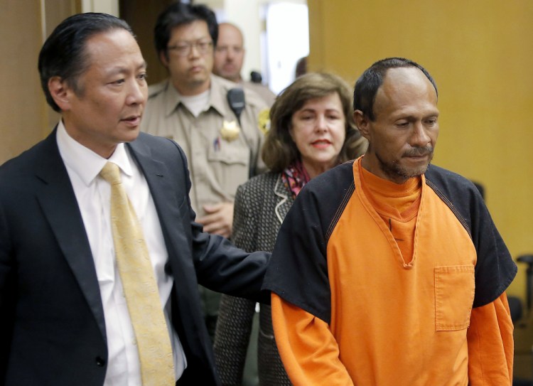 Jose Ines Garcia Zarate, right, is led into the courtroom by San Francisco Public Defender Jeff Adachi, left, and Assistant District Attorney Diana Garciaor for his arraignment on July 7, 2015. A jury acquitted him Thursday on possible charges ranging from involuntary manslaughter to first-degree murder.