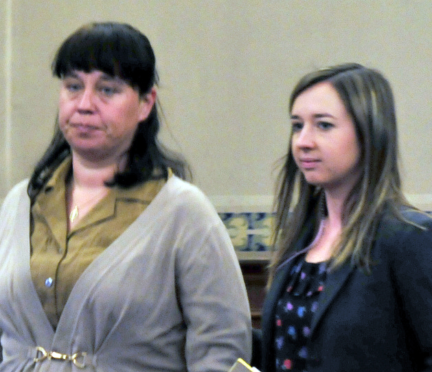 Defendant Miranda Hopkins, of Troy, left, enters Waldo County Superior Court in Belfast with her attorney, Laura Shaw, on Tuesday. 