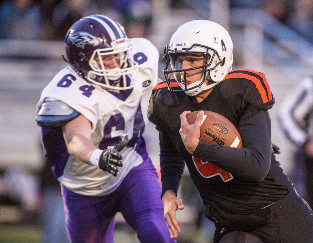Skowhegan quarterback Marcus Christopher, right, will lead the top-seeded Indians against No. 5 Brewer in the Class B North semifinals Friday night in Skowhegan.