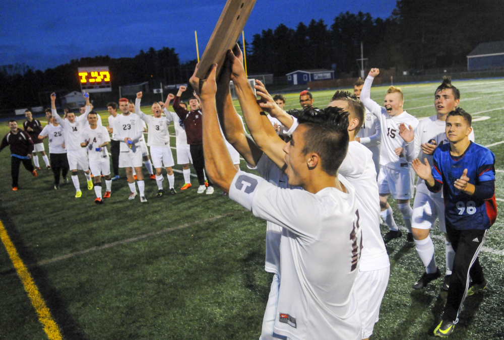 Richmond celebrates after defeating Buckfield in the Class D South championship Thursday at McMann Field in Bath.