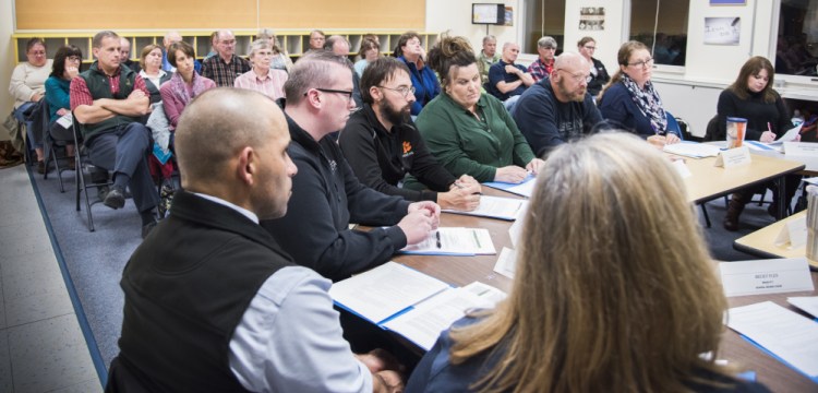 An ad-hoc committee on the future of the TC Hamlin School meets Monday night at the school in Randolph. An audience of more than 20 parents and residents listened to the committee's discussion.
