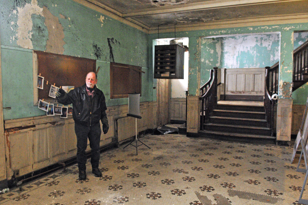 Richard Parkhurst talks about renovation plans during a tour Feb. 10 at the Colonial Theatre in downtown Augusta.